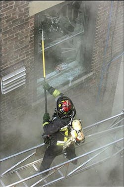 GAS EXPLOSION: A Boston firefighter stands on an elevated ladder as he breaks a window in a building in Boston's Fenway neighborhood Wednesday, April 6, 2005. Seven people suffered minor injuries when an apparent gas explosion heavily damaged the rear of the Northeastern University dormitory, authorities said. (AP Photo/Steven Senne) GAS EXPLOSION: A Boston firefighter stands on an elevated ladder as he breaks a window in a building in Boston's Fenway neighborhood Wednesday, April 6, 2005. Seven people suffered minor injuries when an apparent gas explosion heavily damaged the rear of the Northeastern University dormitory, authorities said. (AP Photo/Steven Senne)