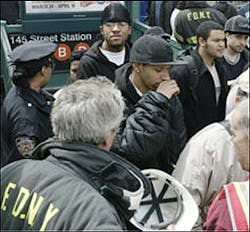COMING UP FOR AIR: Riders make their way out of the 145th Street subway station after being evacuated from stuck B and D trains. A conductor kept many of them in the dark by not explaining why the train stopped. COMING UP FOR AIR: Riders make their way out of the 145th Street subway station after being evacuated from stuck B and D trains. A conductor kept many of them in the dark by not explaining why the train stopped.