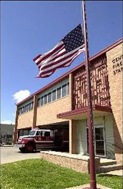 Honoring a Brother: An Amarillo Fire Department truck responds to a morning call as the American flag flies at half-staff at the department's Central Fire Station on Monday in honor of Christopher Brian Hunton. Honoring a Brother: An Amarillo Fire Department truck responds to a morning call as the American flag flies at half-staff at the department's Central Fire Station on Monday in honor of Christopher Brian Hunton.