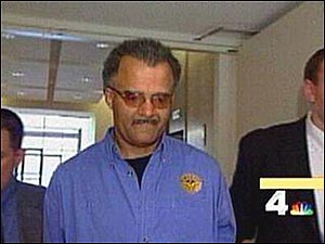 In this still framegrab provided by WRC News 4 TV, Thomas Sweatt, left, is escorted to federal court in Greenbelt, Md., Wednesday, April 27, 2005. Sweatt faces multiple charges in connection with arsons in Washington, suburban Maryland and northern Virginia and is charged with six federal counts in Maryland and five in Washington.