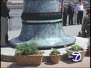 Wrapped around 'The Beacon' is also a poetic message that reads: 'Brooklyn Remembers those Lost on September 11, 2001.'
