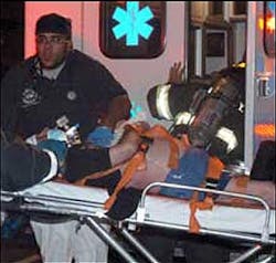 Longtime Four Seasons waiter Jorge Marquez is wheeled out of his East 59th Street building yesterday. He died in a fire on the 13th floor. Longtime Four Seasons waiter Jorge Marquez is wheeled out of his East 59th Street building yesterday. He died in a fire on the 13th floor.