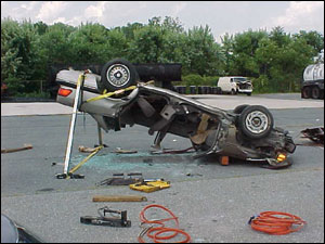 With the decision made to slide the roof out of the driver&rsquo;s side once it was free, the passenger&rsquo;s-side pillars were cut at the roofline and the driver&rsquo;s-side pillars at door level. This gave the team the maximum amount of space to slide the roof out from under the vehicle.