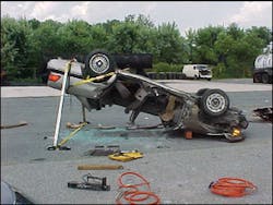 With the decision made to slide the roof out of the driver’s side once it was free, the passenger’s-side pillars were cut at the roofline and the driver’s-side pillars at door level. This gave the team the maximum amount of space to slide the roof out from under the vehicle. With the decision made to slide the roof out of the driver’s side once it was free, the passenger’s-side pillars were cut at the roofline and the driver’s-side pillars at door level. This gave the team the maximum amount of space to slide the roof out from under the vehicle.