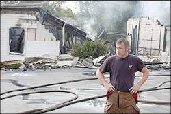 Derek Wilson, a Sparta city firefighter, surveys damage at Roberts Street Church of Christ in Sparta, Tenn., Friday, July 8, 2005. Derek Wilson, a Sparta city firefighter, surveys damage at Roberts Street Church of Christ in Sparta, Tenn., Friday, July 8, 2005.