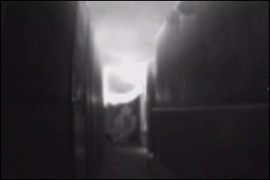 As a company progresses down a smoky hallway, the thermal imager identifies that fire has broken through a hallway door. This shows that the truck company operating in front of the engine risks being cut off, while identifying the apartment of origin to the hose team.