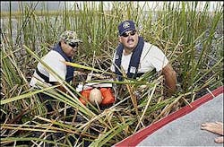 Using a mannequin, Mitch Stewart and Lt. Fred North of the BSO fire rescue practice an Everglades rescue with their airboat ambulance. Using a mannequin, Mitch Stewart and Lt. Fred North of the BSO fire rescue practice an Everglades rescue with their airboat ambulance.