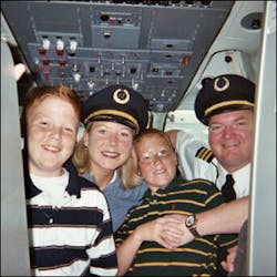 Selena and Glen Schmidt and their sons Trevin and Justin during a visit to Glen’s “workplace” in an Air Train Airways cockpit. Selena and Glen Schmidt and their sons Trevin and Justin during a visit to Glen’s “workplace” in an Air Train Airways cockpit.