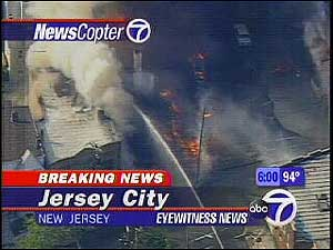 At least five vehicles in the area were in flames, and thick choking smoke forced residents to evacuate their homes.