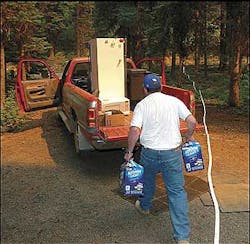 Ed Crawford of Pomeroy, Wash., loads up his vehicle at his Stentz Springs cabin, near Pomeroy, Wash., Tuesday, Aug. 9, 2005. Fire managers now have more than 1,300 firefighters on the aggressive School fire in southeast Washington. More than 130 engines and pumpers are on that blaze, which started Friday and blew up over the weekend. Ed Crawford of Pomeroy, Wash., loads up his vehicle at his Stentz Springs cabin, near Pomeroy, Wash., Tuesday, Aug. 9, 2005. Fire managers now have more than 1,300 firefighters on the aggressive School fire in southeast Washington. More than 130 engines and pumpers are on that blaze, which started Friday and blew up over the weekend.
