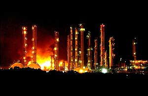 A fire burns at the Innovene plant, formerly BP Amoco Chemical, about 15 miles southwest of Hitchcock, Texas, Wednesday night, Aug. 10, 2005. Lt. Becky McCall of the Brazoria County Sheriff's Department said everyone at the plant had been accounted for and there were no injuries.