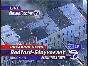 There is heavy fire on the second and third floors.