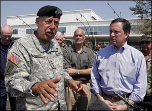 USAF Lt. General Russel Honore, left, talks with reporters in New Orleans, La., Sunday, Sept. 4, 2005. At center is Homeland Security Director Michael Chertoff, and FEMA Director Mike Brown, right.