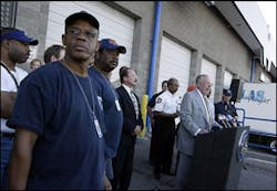 New Orleans firefighter Ronald Mason, left, listens to Las Vegas Mayor Oscar Goodman during a news conference Tuesday, Sept. 6, 2005, in Las Vegas. More than 40 New Orleans firefighters and their loved ones arrived in Las Vegas for a short vacation. New Orleans firefighter Ronald Mason, left, listens to Las Vegas Mayor Oscar Goodman during a news conference Tuesday, Sept. 6, 2005, in Las Vegas. More than 40 New Orleans firefighters and their loved ones arrived in Las Vegas for a short vacation.