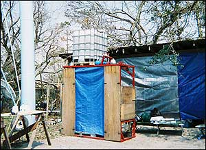 Firefighters from Pass Christian, Mississippi constructed a makeshift shower out of the frame of a CPAT push-pull station.