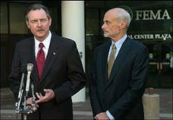 The new acting director of the Federal Emergency Management Agency R. David Paulison, left, speaks during a news conference with Homeland Security Secretary Michael Chertoff outside FEMA Headquarters on Tuesday, Sept. 13, 2005 in Washington. Paulison pledged Tuesday to intensify efforts to finding more permanent housing for the tens of thousands of Hurricane Katrina survivors now in shelters. He replaced Michael Brown, who resigned on Monday, three days after being removed from being the top onsite federal official in charge of the government's response. The new acting director of the Federal Emergency Management Agency R. David Paulison, left, speaks during a news conference with Homeland Security Secretary Michael Chertoff outside FEMA Headquarters on Tuesday, Sept. 13, 2005 in Washington. Paulison pledged Tuesday to intensify efforts to finding more permanent housing for the tens of thousands of Hurricane Katrina survivors now in shelters. He replaced Michael Brown, who resigned on Monday, three days after being removed from being the top onsite federal official in charge of the government's response.