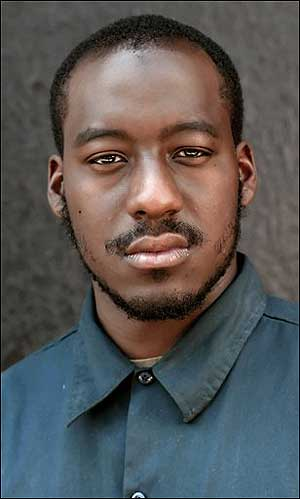 Curtis De Veaux poses for a photo in Philadelphia Wednesday, June 1, 2005. The Muslim firefighter cannot wear a beard on the job because of the safety risk that facial hair poses, a judge ruled Thursday, Sept. 22, 2005. De Veaux had sued the city on grounds that a ban on beards infringed on his Muslim faith, which generally requires men to grow beards. But the state judge sided with the city, calling safety a compelling interest that warrants an exception under the Pennsylvania Religious Freedom Protection Act.