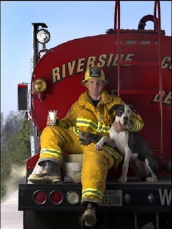 This photo provided by the California Milk Advisory Board shows California firefighter and cookie recipe-contest winner Clinton Marsalek posing with the fire station dog Koda, at the California Department of Forestry station in Riverside County where he works. The photo is in the 2006 Milk and Cookies calendar; proceeds from the calendar's sale benefit the California Fire Foundation and California Firefighters Memorial. This photo provided by the California Milk Advisory Board shows California firefighter and cookie recipe-contest winner Clinton Marsalek posing with the fire station dog Koda, at the California Department of Forestry station in Riverside County where he works. The photo is in the 2006 Milk and Cookies calendar; proceeds from the calendar's sale benefit the California Fire Foundation and California Firefighters Memorial.