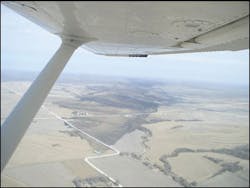 Aerial photo shows the path of the Pottawattamie County fire etching for miles across the landscape.