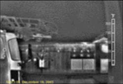 Prior to ladder or hose deployment, the first-in officer can see that heavy heat is building up underneath the truss roof of this Type III building. If there is no life-safety threat, this could dramatically alter the officer's strategy and tactics. Prior to ladder or hose deployment, the first-in officer can see that heavy heat is building up underneath the truss roof of this Type III building. If there is no life-safety threat, this could dramatically alter the officer's strategy and tactics.