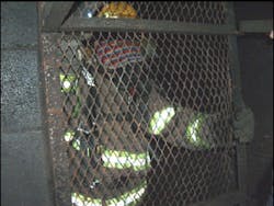 PHOTO 10: The exit from a room in the burn building is blocked to simulate the lost/trapped mayday parameter. PHOTO 10: The exit from a room in the burn building is blocked to simulate the lost/trapped mayday parameter.