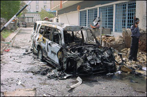 These vehicles were damaged by a car bomb in Iraq. Specialized training is needed before fire and EMS departments can respond to actual or suspected incidents involving vehicle-borne improved explosive devices.