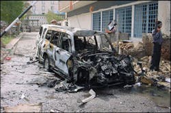 These vehicles were damaged by a car bomb in Iraq. Specialized training is needed before fire and EMS departments can respond to actual or suspected incidents involving vehicle-borne improved explosive devices.