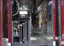 The body interior is equipped with a bench seat for six personnel with an enclosed storage area for folding, roof and extension ladders together with several Clemens and halligan hooks.