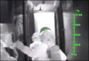 Photo 2: The company officer can see that he has three firefighters advancing down the hallway towards the room of origin. As a result, he knows that the entire company is with him at this point in the incident.