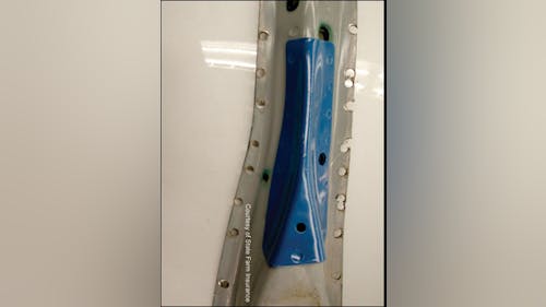 The opposite side of the Subaru Forester B-pillar clearly shows the additional high-strength, high-tension steel added at the mid point of the pillar. Blue paint has been added to enhance its visibility for training purposes. Note the location of the top door hinge mounting holes to better understand where this reinforcement is located in relation to the vehicle itself. The opposite side of the Subaru Forester B-pillar clearly shows the additional high-strength, high-tension steel added at the mid point of the pillar. Blue paint has been added to enhance its visibility for training purposes. Note the location of the top door hinge mounting holes to better understand where this reinforcement is located in relation to the vehicle itself.