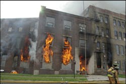 A view of the east side of the building demonstrates some of the access problems encountered during the operation. A view of the east side of the building demonstrates some of the access problems encountered during the operation.