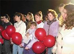 Claire McNamara hugs her daughter, Molli, at a memorial for Martin McNamara in Lancaster, Tuesday evening Claire McNamara hugs her daughter, Molli, at a memorial for Martin McNamara in Lancaster, Tuesday evening