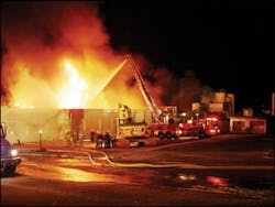 After worsening conditions forced interior crews to withdraw, defensive operations were initiated using two aerials, a deck gun and handlines. After worsening conditions forced interior crews to withdraw, defensive operations were initiated using two aerials, a deck gun and handlines.