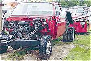 TRUCK FOUND: The remains of the Poynor fire truck sits in a junk yard in Rusk Tuesday. The fire truck was stolen in April and found Monday near Rusk.