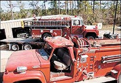The fire engine in the background will replace the one in the foreground, which was smashed by a falling tree during Hurricane Rita. The fire engine in the background will replace the one in the foreground, which was smashed by a falling tree during Hurricane Rita.