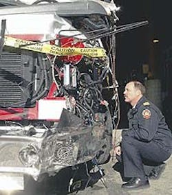 Burgess inspects extensive damage to a fire truck that was stolen while on a call Sunday morning. It will have to be repaired or replaced. Burgess inspects extensive damage to a fire truck that was stolen while on a call Sunday morning. It will have to be repaired or replaced.