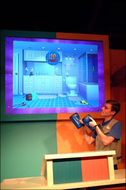 A member of the Epcot teams points out hazards in the bathroom that visitors missed in the exhibit. A member of the Epcot teams points out hazards in the bathroom that visitors missed in the exhibit.