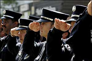 Denver firefighters salute fallen Denver firefighter Lt. Rich Montoya on May 25.