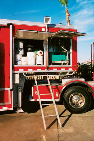 Two generators are built into the front compartment of the trailer.