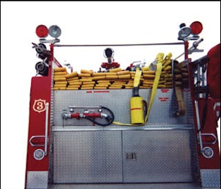 This engine has a bypass eductor externally mounted on the driver&acirc;&euro;&trade;s-side rear discharge. The compartment directly below holds five-gallon containers of foam concentrate. Notice the medium expansion nozzle installed on the end of a rear pre-connect fed by the eductor. This makes getting to work with foam simple and easy, with the minimum number of steps.