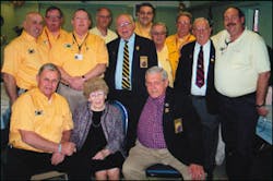 Ella Ernst, founder and charter president of the Ladies Auxiliary of the Firemen’s Association of the State of New York (LAFASNY) and current resident of the Firemen’s Home in Hudson, celebrated her 100th birthday at a ceremony and party at the home attended by firefighters and friends from all over the state. Born in Germany in 1906, Mrs. Ernst came to the U.S. via Ellis Island. She later became the wife of a volunteer firefighter, joined the Point Pleasant Auxiliary in Monroe County and led the formation of LAFASNY in 1948. Attending the festivities with Mrs. Ernst were, seated from left, Fireman’s Home Trustee John Montrose (New York Mills) and former trustee Donald Fox (Fairport); standing, from left, are Trustees Jose DaRocha (Albertson), David Schultz (East Rochester), Michael Ryan (Solvay) and John Farrell Jr. (Athens), Vice President James Wright (Norwich), Home Administrator Craig Wittman, Trustee Robert McKinney (Diamond Point), Secretary Steven Klein (Oceanside), former trustee Robert Darling (Catskill) and Trustee Paul O’Brien (Verplanck). Ella Ernst, founder and charter president of the Ladies Auxiliary of the Firemen’s Association of the State of New York (LAFASNY) and current resident of the Firemen’s Home in Hudson, celebrated her 100th birthday at a ceremony and party at the home attended by firefighters and friends from all over the state. Born in Germany in 1906, Mrs. Ernst came to the U.S. via Ellis Island. She later became the wife of a volunteer firefighter, joined the Point Pleasant Auxiliary in Monroe County and led the formation of LAFASNY in 1948. Attending the festivities with Mrs. Ernst were, seated from left, Fireman’s Home Trustee John Montrose (New York Mills) and former trustee Donald Fox (Fairport); standing, from left, are Trustees Jose DaRocha (Albertson), David Schultz (East Rochester), Michael Ryan (Solvay) and John Farrell Jr. (Athens), Vice President James Wright (Norwich), Home Administrator Craig Wittman, Trustee Robert McKinney (Diamond Point), Secretary Steven Klein (Oceanside), former trustee Robert Darling (Catskill) and Trustee Paul O’Brien (Verplanck).
