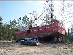 This shrimp boat now sits about a mile from the ocean. This shrimp boat now sits about a mile from the ocean.