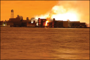 The fire rages almost 46 hours later as seen from Manhattan across the East River. On the first 10 alarms, 44 engines and 26 ladder companies responded. The complex was at one time the world&acirc;&euro;&trade;s largest manufacturer of marine rope. An FDNY fireboat was stationed alongside the complex at the East River for many years.
