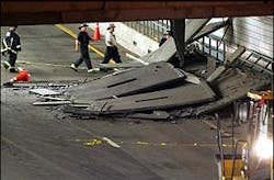 Firefighters inspect a section of ceiling in the Interstate 90 connector tunnel eastbound through Boston that collapsed onto the roadway and killed a woman passenger. Firefighters inspect a section of ceiling in the Interstate 90 connector tunnel eastbound through Boston that collapsed onto the roadway and killed a woman passenger.