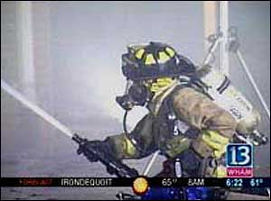 The Spencerport force couldn't fight the fire because their gear was inside and they had to rely on other departments.