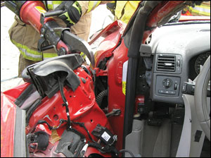 There were no problems cutting or spreading the now-exposed hinges to remove the door. Forcing at the latch end in a conventional manner was also effective, if the tool operator worked the tips into the inner portions of the door structure and did not pry on the lightweight skin of the inner panel of the door itself.