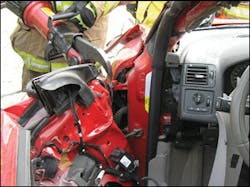 There were no problems cutting or spreading the now-exposed hinges to remove the door. Forcing at the latch end in a conventional manner was also effective, if the tool operator worked the tips into the inner portions of the door structure and did not pry on the lightweight skin of the inner panel of the door itself. There were no problems cutting or spreading the now-exposed hinges to remove the door. Forcing at the latch end in a conventional manner was also effective, if the tool operator worked the tips into the inner portions of the door structure and did not pry on the lightweight skin of the inner panel of the door itself.