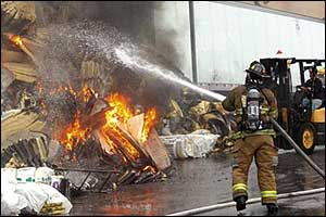 More than 100 firefighters and 40 firetrucks from three counties converged to battle the blaze, but were hampered by water supply problems.