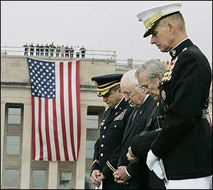 Vice President Dick Cheney, second left, and Defense Secretary Donald H. Rumsfeld, second right, stand with Joint Chiefs Chairman Gen. Peter Pace, right, and U.S. Army Chaplain Lt. Col. William O. Barefield, far left, during a memorial ceremony for the fifth anniversary of the terrorist attacks.