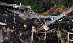 Notice all of the different types of entanglements in this picture. Several different types of wiring, metal shelves, wood rafters, etc. Now imagine being entangled in this environment with zero visibility and heat pushing down on you.